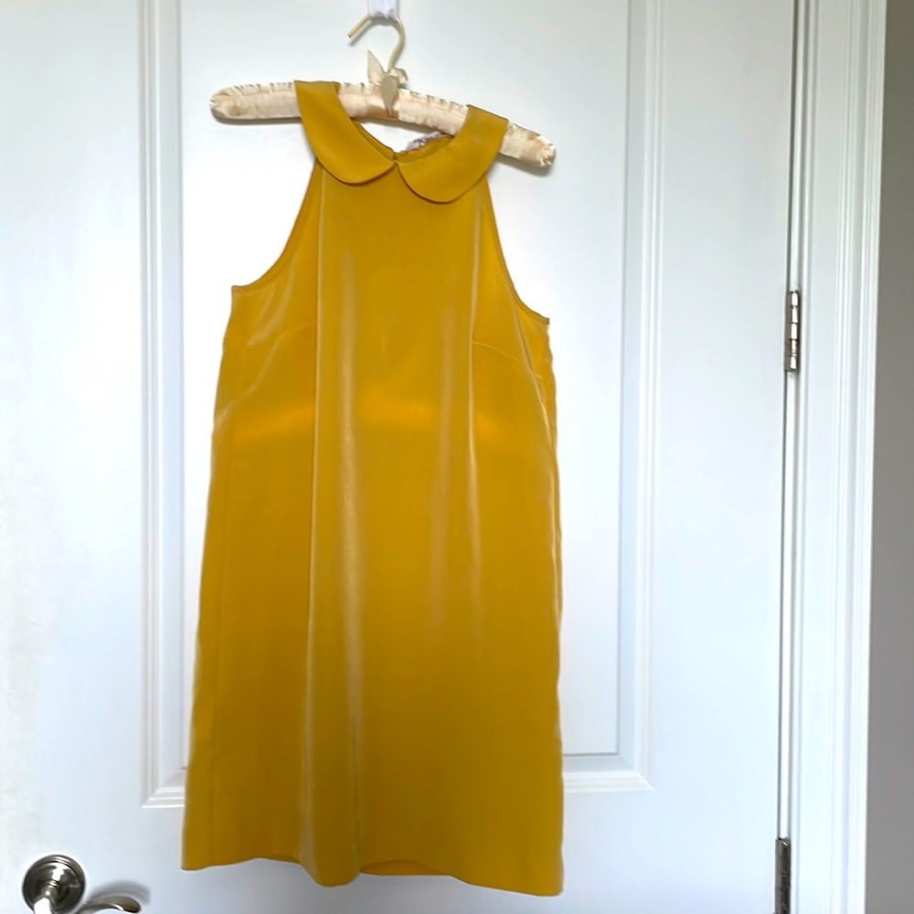 Cute gold sleeveless BCBG dress
